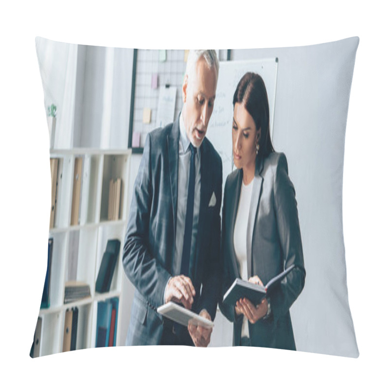 Personality  Mature Investor Using Digital Tablet Near Businesswoman With Notebook In Office, Banner  Pillow Covers