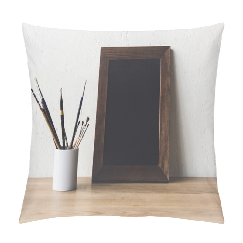 Personality  Photo Frame And Paintbrushes On Tabletop Pillow Covers