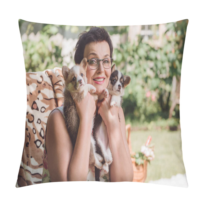 Personality  Happy Brunette Middle Aged Woman Holding Welsh Corgi Puppies While Sitting In Deck Chair In Garden Pillow Covers