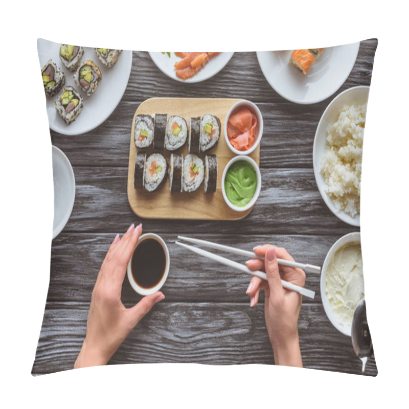 Personality  Cropped Shot Of Person Holding Chopsticks And Eating Delicious Sushi Pillow Covers