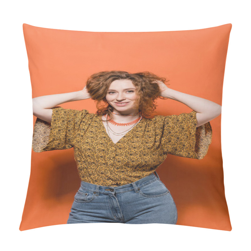 Personality  Trendy Young Redhead Woman In Modern Blouse With Pattern And Jeans Touching Hair And Standing On Orange Background, Stylish Casual Outfit And Summer Vibes Concept, Youth Culture Pillow Covers