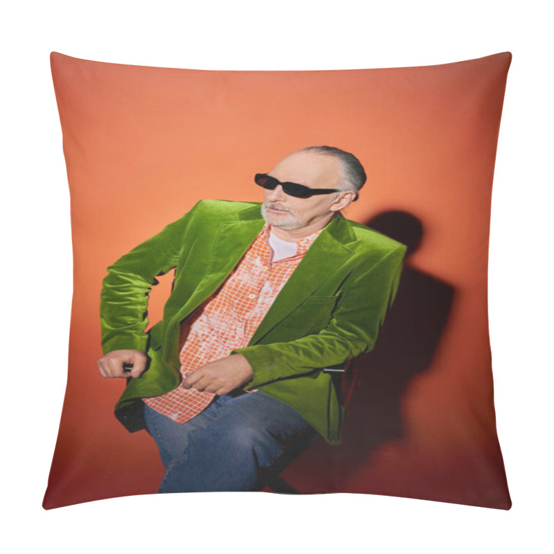 Personality  Senior And Confident Bearded Man Sitting On Chair And Looking Away On Red And Orange Background With Shadow, Fashion Look, Dark Sunglasses, Trendy Shirt, Green Velour Blazer, Fashion And Age Concept Pillow Covers