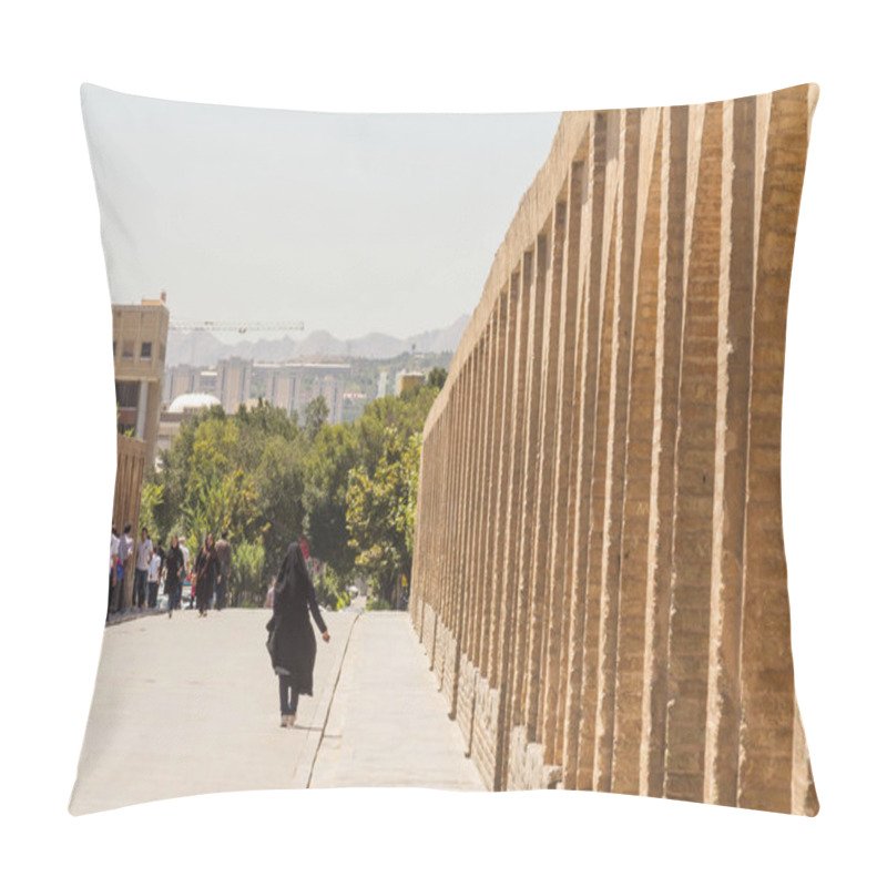 Personality  ISFAHAN, IRAN - AUGUST 7, 2015: Iranian Woman Wearing The Traditional Muslim Black Veil Waling On Si O Seh Pol Bridge. Also Known As Allahverdi Khan Bridge,  It Is A Major Landmark Of The City Pillow Covers