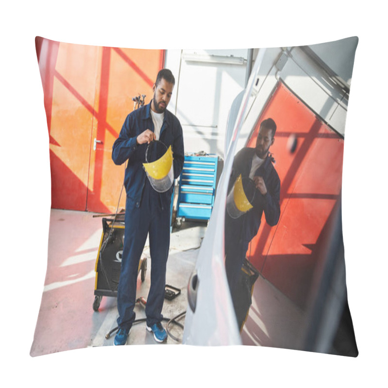 Personality  Young And Handsome Mechanic Adjusts His Protective Gear In A Modern Garage Setting Pillow Covers