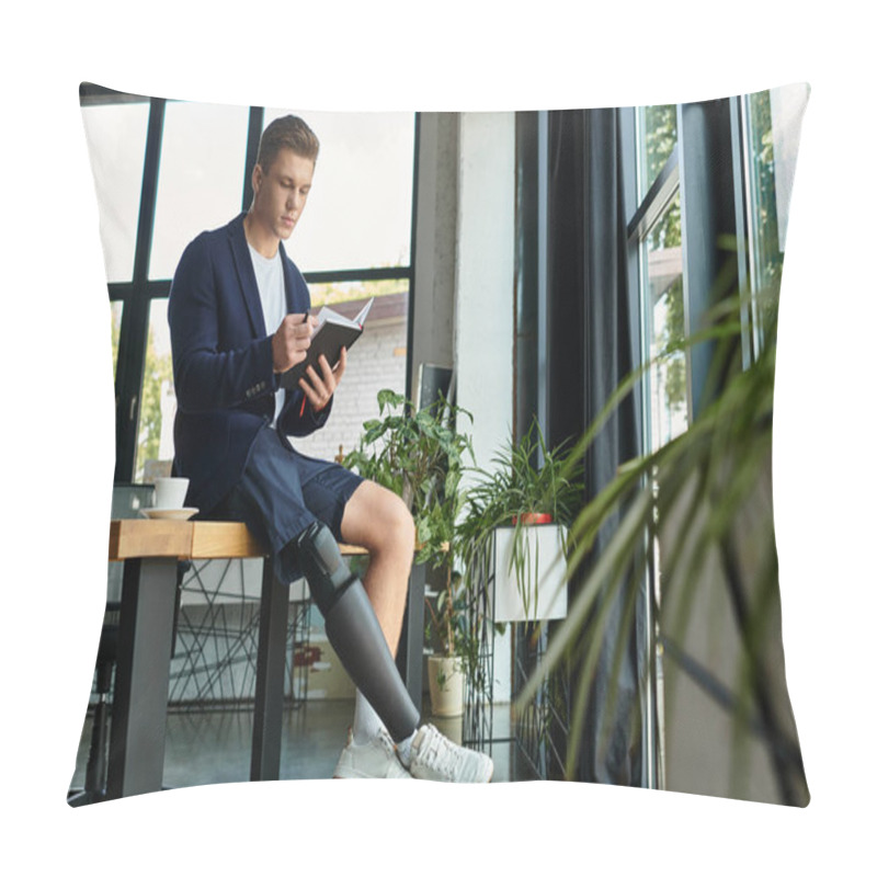 Personality  A Young And Confident Man With An Artificial Limb Sits At A Desk, Writing Diligently In A Sleek Office Environment. Pillow Covers