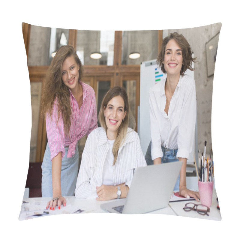 Personality  Group Of Young Cheerful Women With Laptop Happily Looking In Camera Spending Time Together At Work. Beautiful Stylish Girls Joyfully Working In Modern Cozy Office Pillow Covers