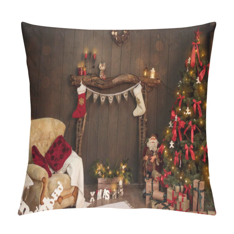 Personality  On A Wooden Fireplace Made Of Old Logs, There Is A Stretch Of Flags With The Inscription Magic, White-red Socks For Santa Claus's Gifts Hang On The Sides. New Year Card With Christmas Tree. Copy Space Pillow Covers