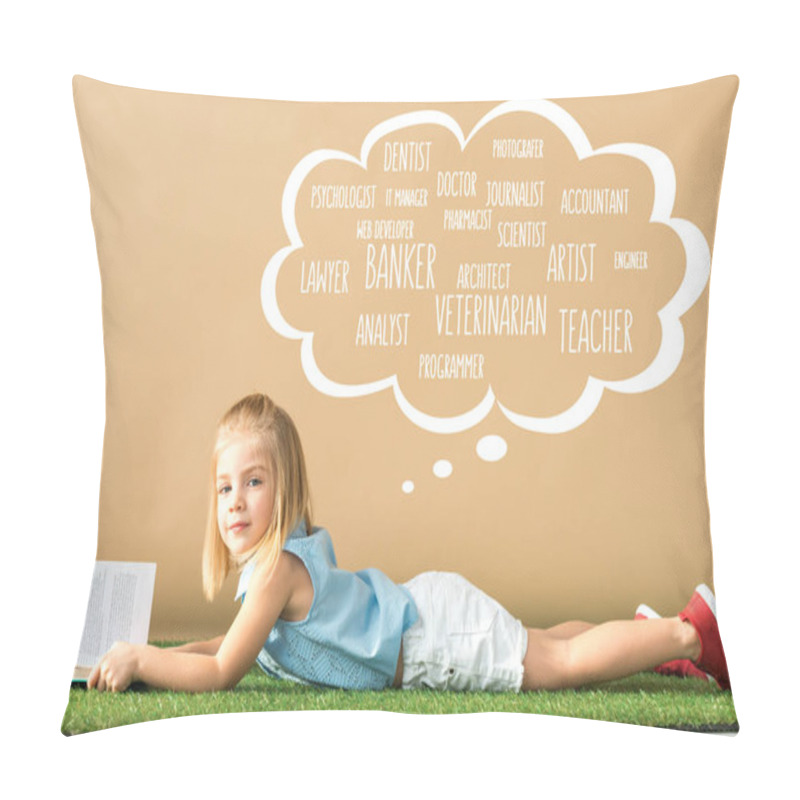 Personality  Cute Kid Lying On Grass Rug And Holding Book On Beige Background With White Thought Bubble With Various Professions  Pillow Covers