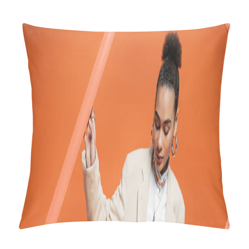 Personality  Elegant Young Fashion Model In Stylish Attire With Bun And Accessories Holding Orange Framework Pillow Covers