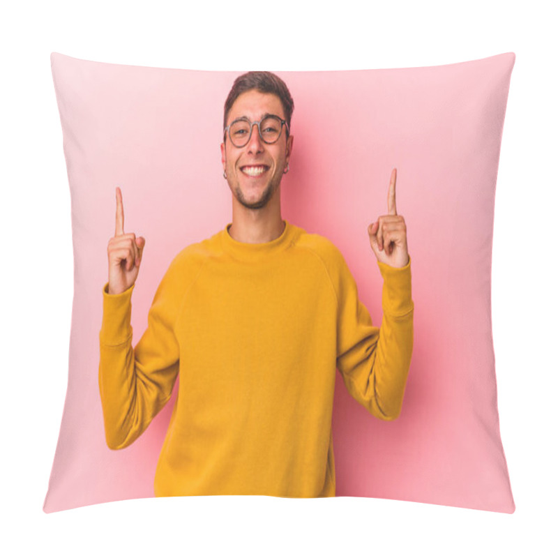 Personality  Young Caucasian Man With Tattoos Isolated On Yellow Background  Indicates With Both Fore Fingers Up Showing A Blank Space. Pillow Covers