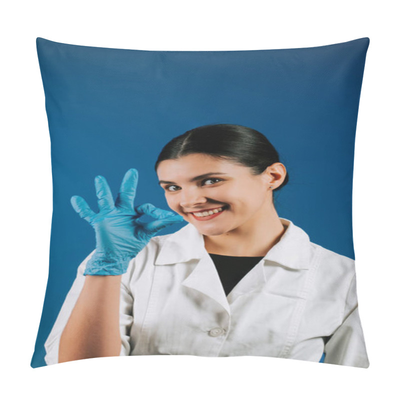 Personality  Portrait Of A Woman Pediatric Doctor In A White Coat With A Stethoscope Against A Blue Background Showcasing Her Dedication To Children's Health Pillow Covers