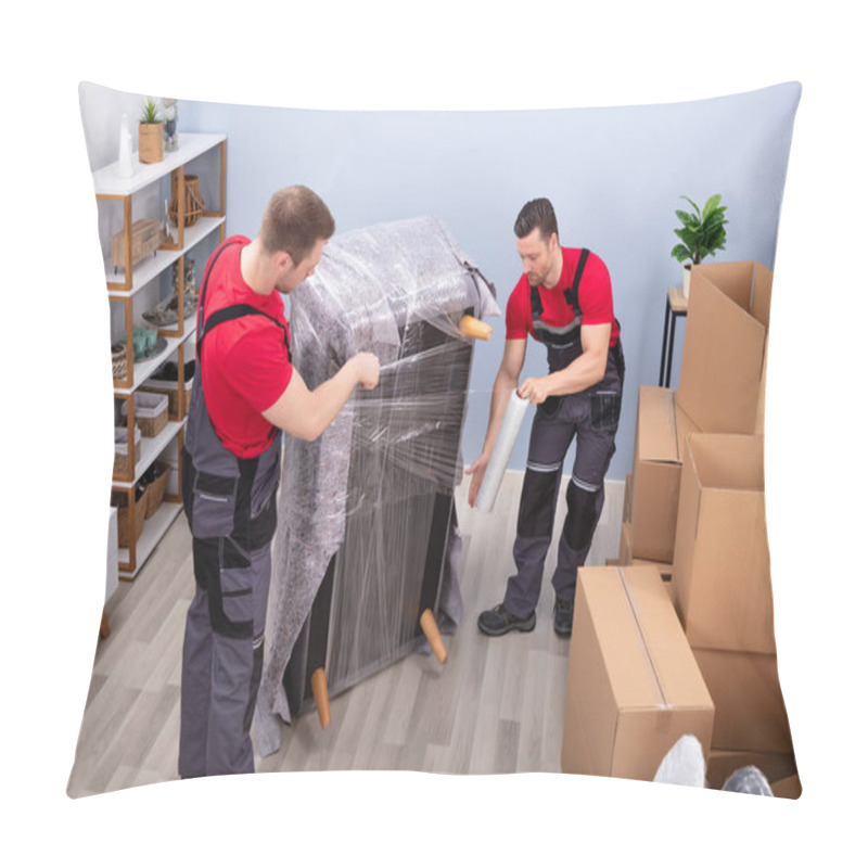 Personality  Two Young Male Movers Wrapping The Sofa With Plastic Wrap In Living Room Pillow Covers