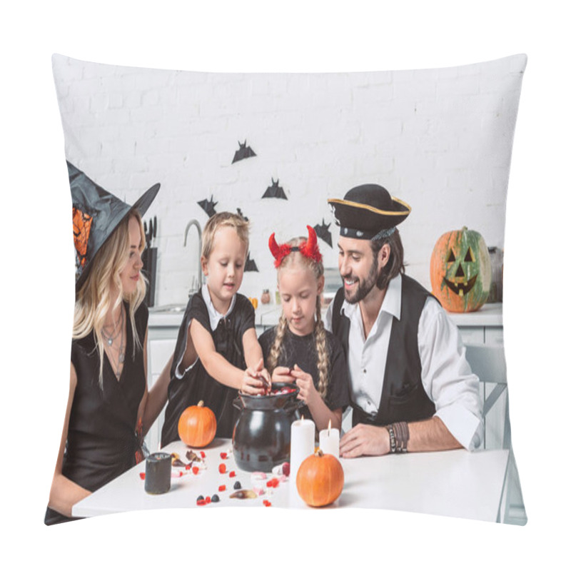 Personality  Family In Various Halloween Costumes At Table With Black Pot With Treats In Kitchen At Home Pillow Covers