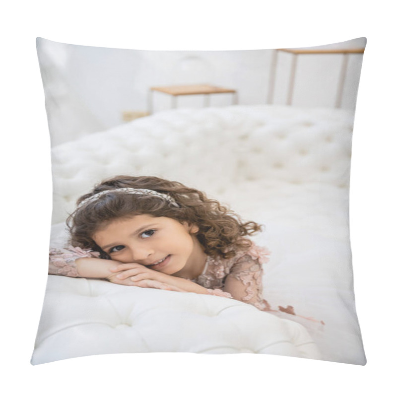 Personality  Portrait Of Cheerful Middle Eastern Girl With Brunette Curly Hair Posing In Floral Dress And Leaning On White Couch Inside Of Luxurious Wedding Salon, Smiling Kid, Blurred Background, Joy  Pillow Covers