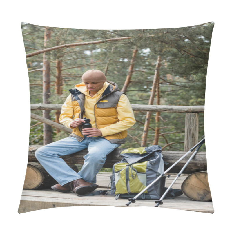 Personality  Tourist In Warm Vest Opening Thermo Bottle During Halt On Log Bench Near Backpack And  Trekking Poles Pillow Covers