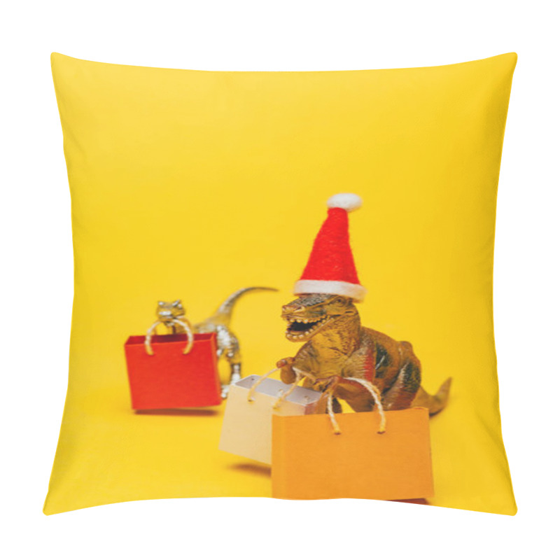 Personality  Selective Focus Of Toy Dinosaurs In Santa Hat And Shopping Bags On Yellow Background Pillow Covers