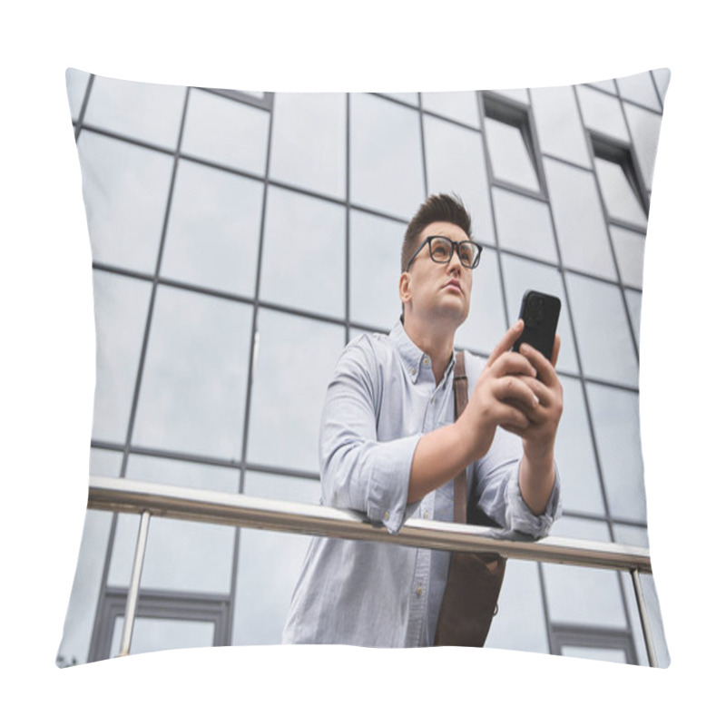 Personality  A Young Man With Glasses Interacts With His Smartphone Near A Modern Building. Pillow Covers