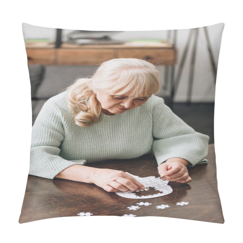 Personality  Senior Woman With Blonde Hair Playing With Puzzles On Table Pillow Covers