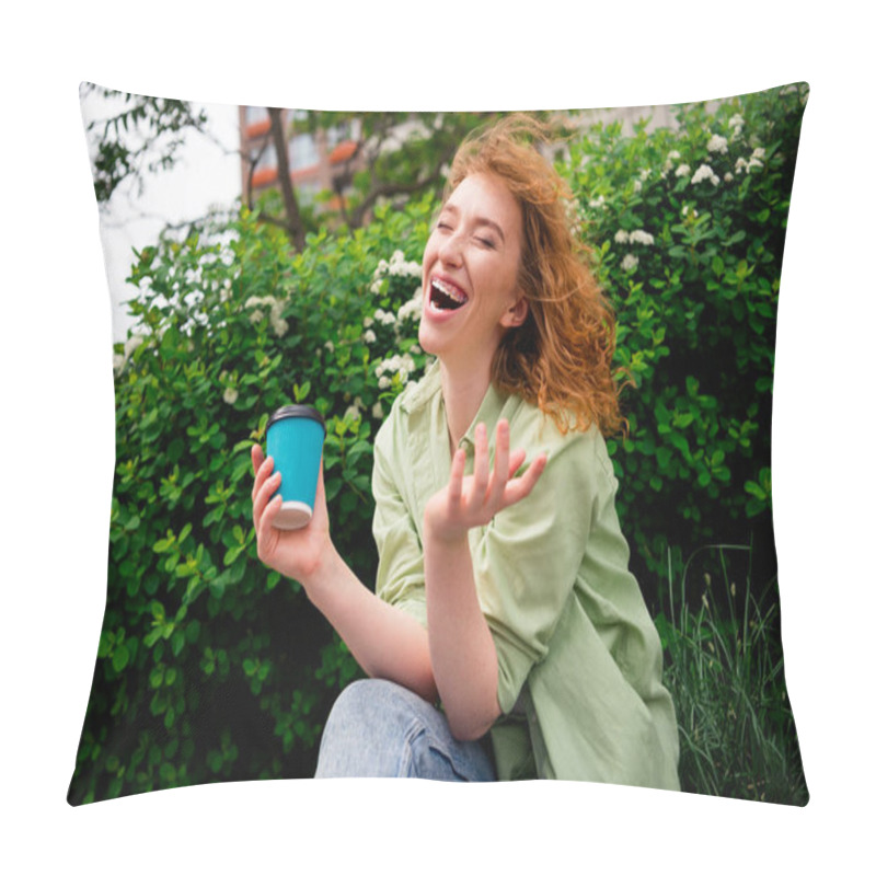 Personality  A Cheerful Young Female Student With Red Hair Laughs Heartily While Sitting Outdoors On A Sunny Day, Holding A Coffee Cup Amidst Lush Greenery. Pillow Covers