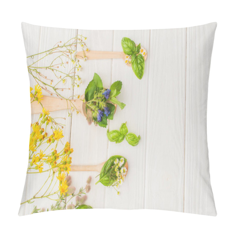 Personality  Top View Of Herbs And Green Leaves In Spoons Near Flowers On White Wooden Background, Naturopathy Concept Pillow Covers