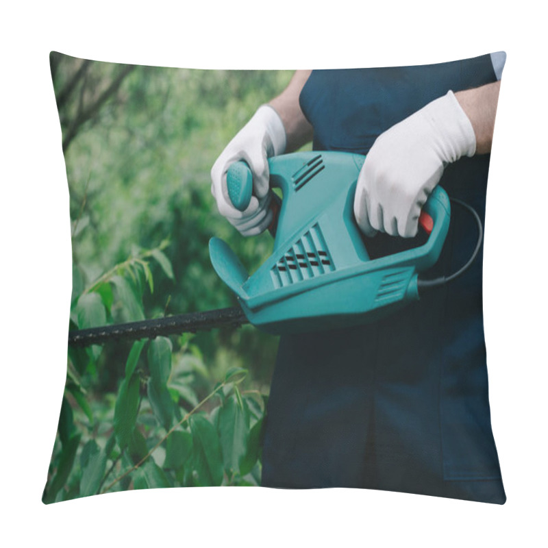 Personality  Partial View Of Gardener Trimming Bushes With Electric Pruner In Park Pillow Covers