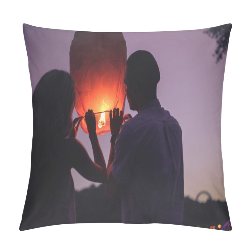 Personality  Back View Of Young Couple Launching Sky Lantern On River Beach In Evening Pillow Covers