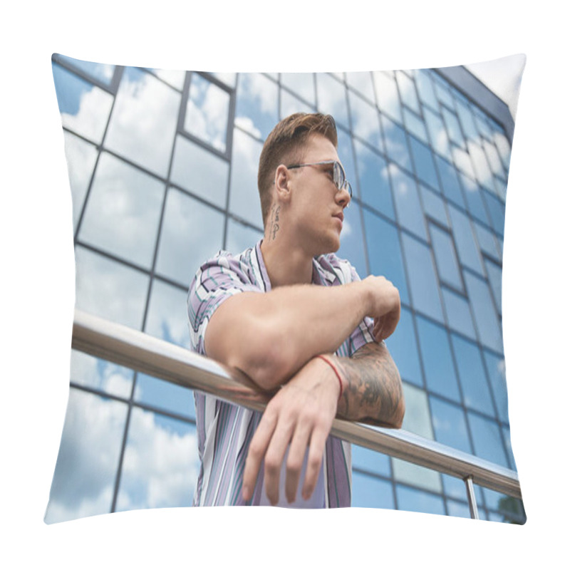 Personality  A Young Man With Tattoos Stands Confidently By A Sleek Glass Building. Pillow Covers