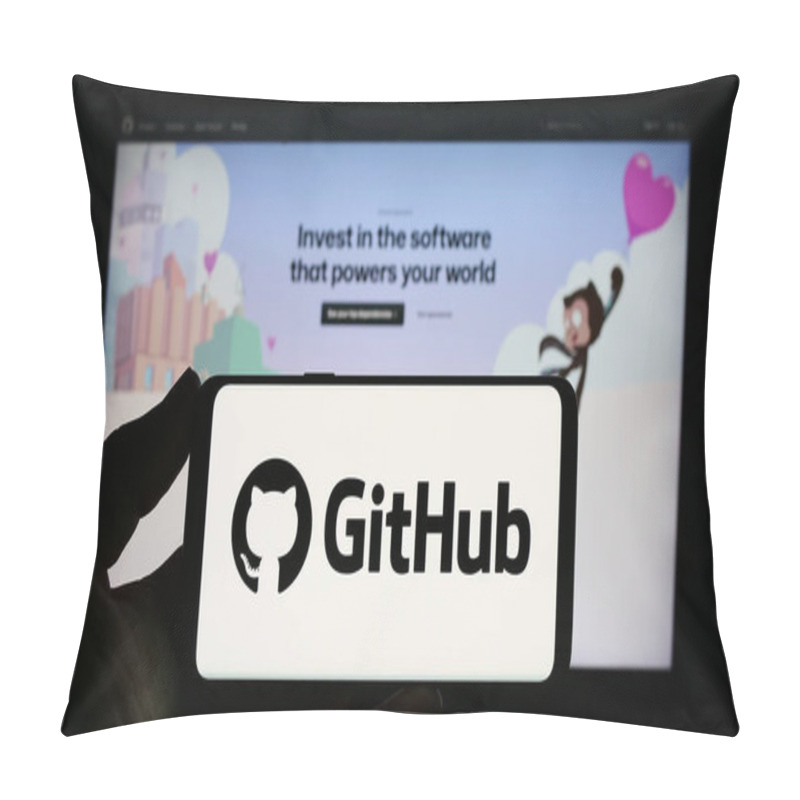 Personality  Stuttgart, Germany - 07-09-2023: Person Holding Smartphone With Logo Of US Software Development Company GitHub Inc. On Screen In Front Of Website. Focus On Phone Display. Pillow Covers