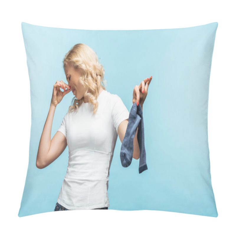 Personality  Curly Blonde Woman Touching Nose While Holding Smelly Dirty Sock On Blue  Pillow Covers