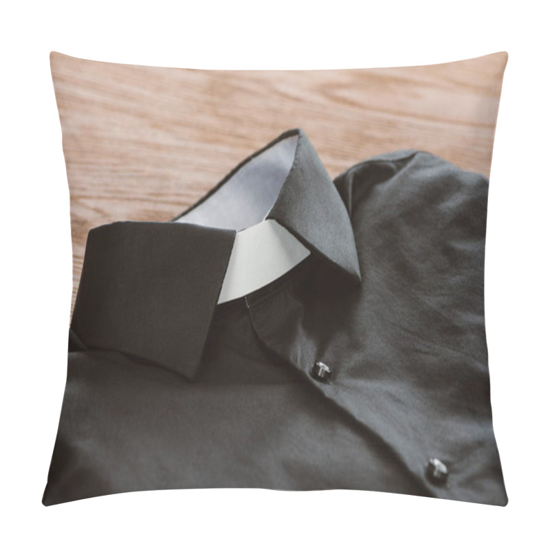 Personality  Close-up Shot Of Clerical Shirt With White Collar On Wooden Surface Pillow Covers