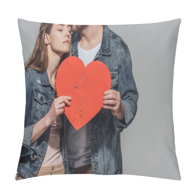 Personality  Cropped Shot Of Young Couple Holding Parts Of Broken Heart Symbol Together And Kissing Isolated On Grey Pillow Covers