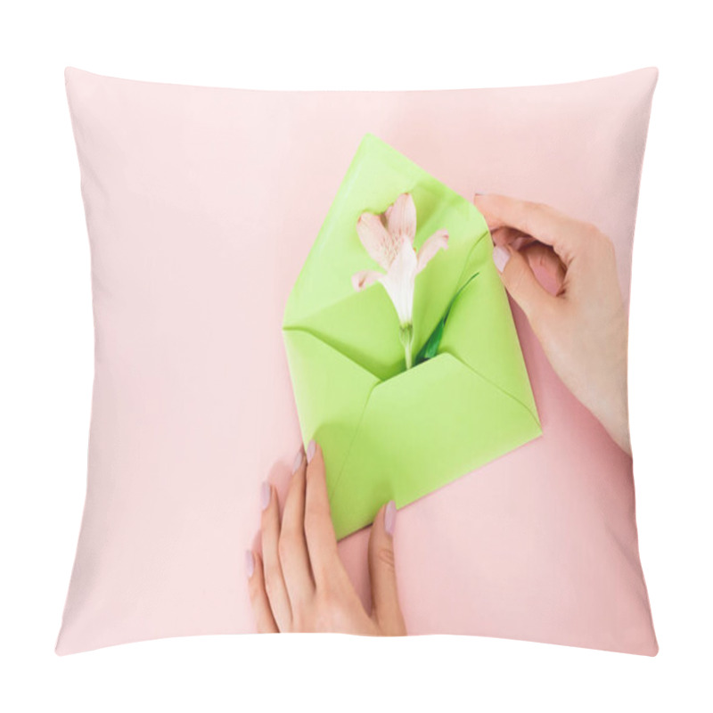 Personality  Cropped View Of Woman Holding Green Envelope With Alstroemeria Flower On Pink, Mothers Day Concept  Pillow Covers