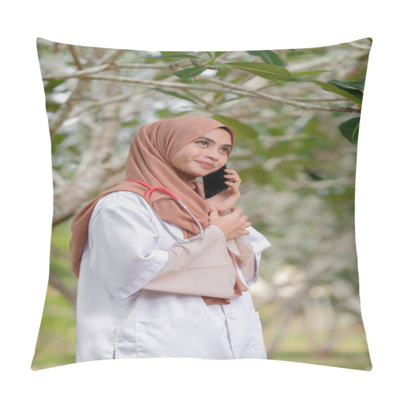 Personality  Female Muslim Veterinarian Holding  A Smartphone In The Hospital Garden. Medical And Healthcare Doctor Service Concept. Pillow Covers