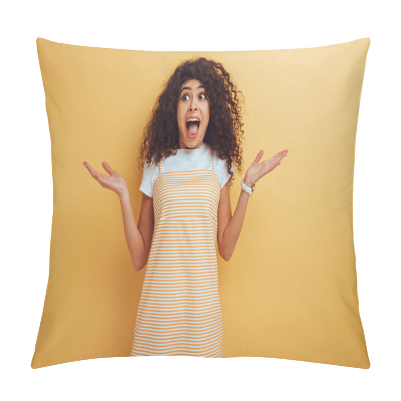 Personality  Shocked Mixed Race Girl Looking Away While Standing With Open Arms On Yellow Background Pillow Covers