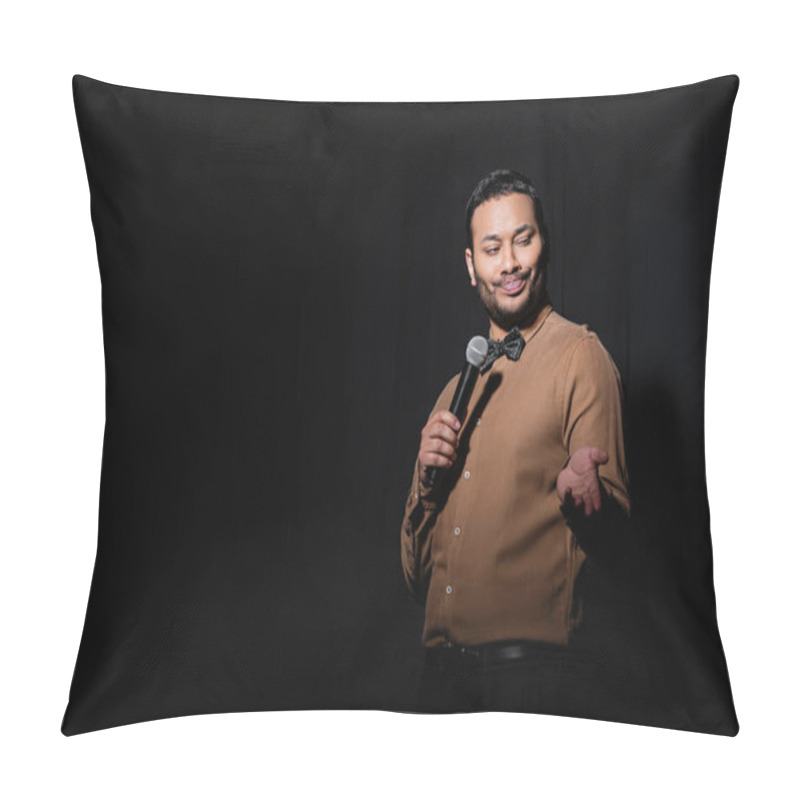 Personality  Skeptical Indian Stand Up Comedian Telling Joke Into Microphone On Dark Stage On Black  Pillow Covers