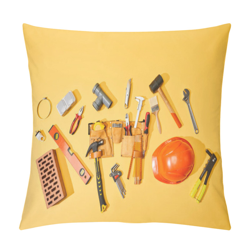 Personality  Top View Of Tool Belt, Brick, Industrial Tools And Helmet On Yellow Background Pillow Covers