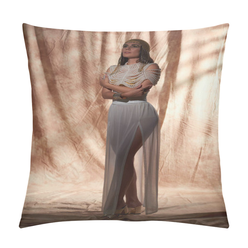 Personality  Brunette And Elegant Woman In Egyptian Look, Pearl Top And Headdress Posing On Abstract Pillow Covers