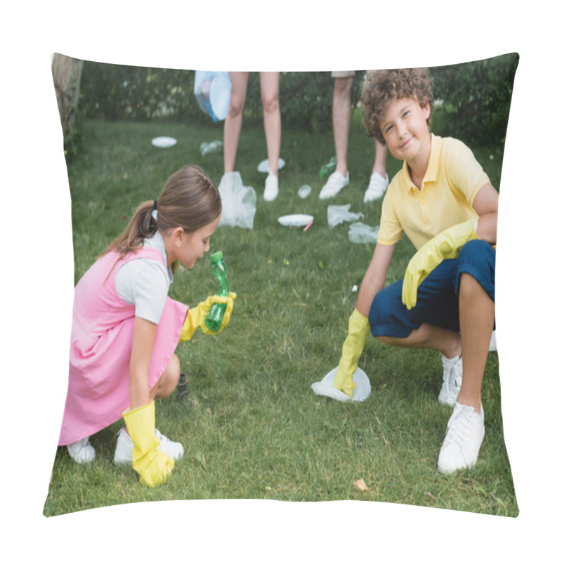 Personality  Smiling Boy In Rubber Gloves Looking At Camera Near Garbage On Lawn And Family Outdoors  Pillow Covers