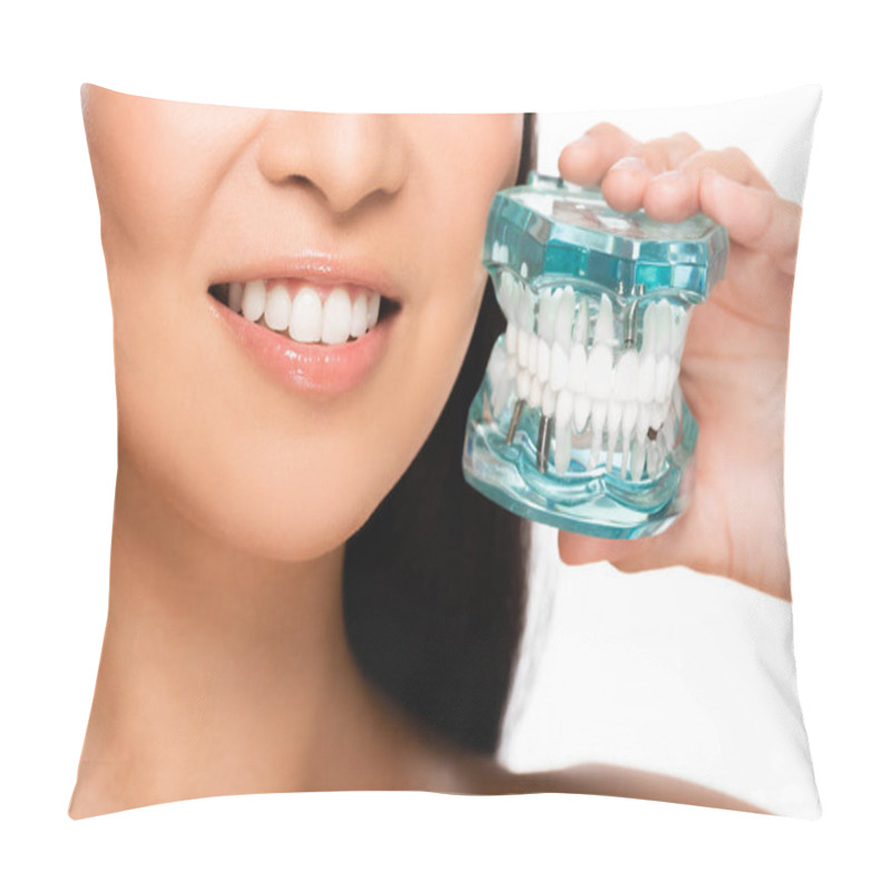 Personality  Partial View Of Smiling Asian Woman Holding Jaw Model Isolated On White Pillow Covers