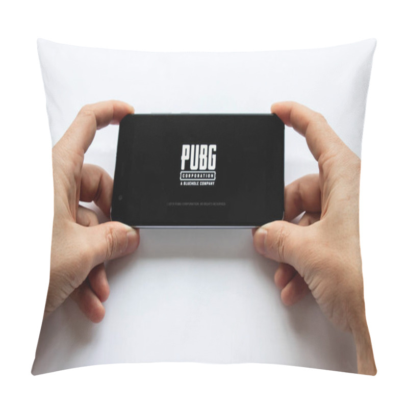 Personality  Brest, Belarus, January 22, 2019. Closeup Male Hands Holding Smartphone With PUBG FPS Game. Battleground Game Logo. Soft Focus. Pillow Covers