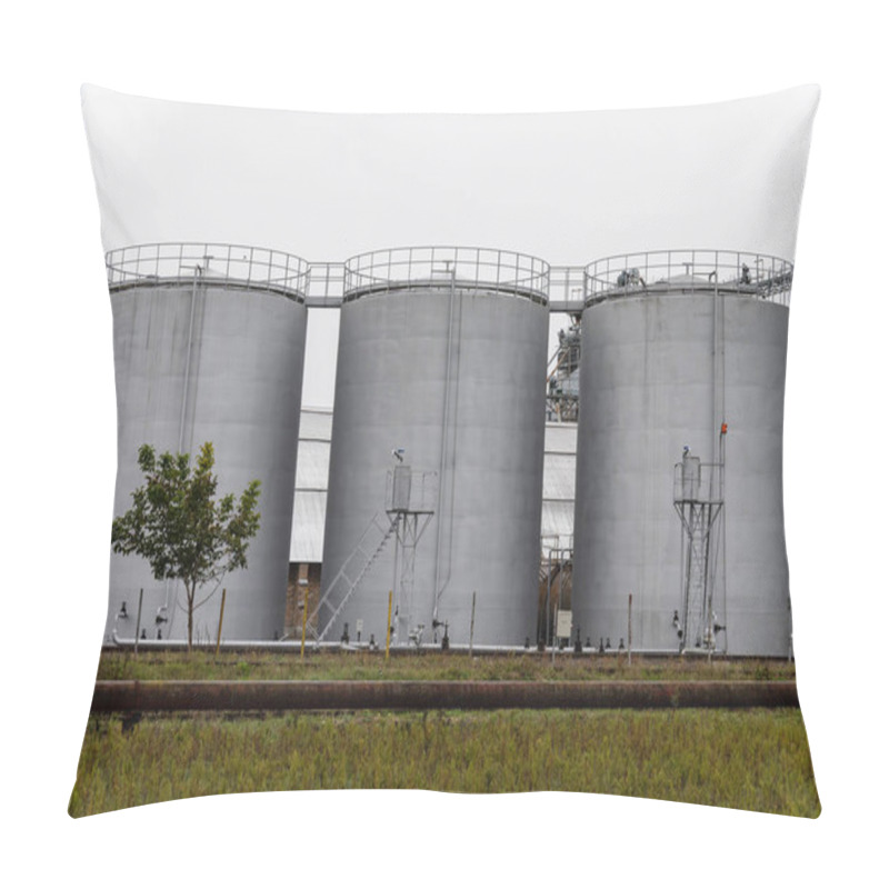 Personality  Three Large Fuel Storage Tanks Stand Prominently In An Industrial Area, Surrounded By Greenery And Under A Gray Sky, Emphasizing Their Sturdy Construction. Pillow Covers