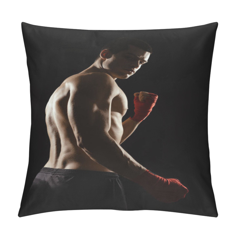 Personality  Portrait Of Male Boxer Posing In Boxing Stance, Looking Over Shoulder, Against Black Background. Pillow Covers