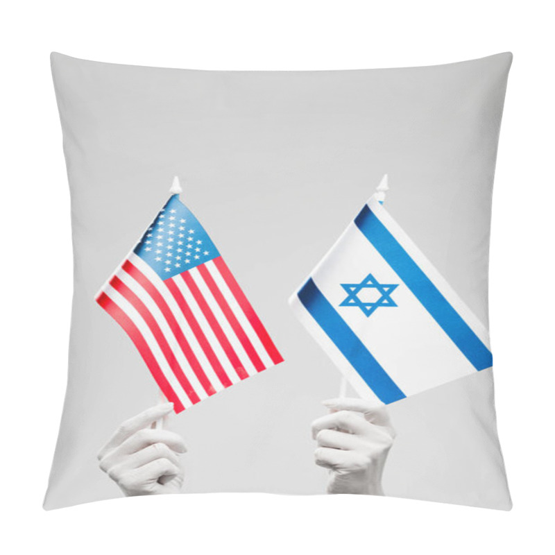 Personality  Cropped View Of Female Hands Painted In White Holding Israel And American Flags Isolated On Grey  Pillow Covers