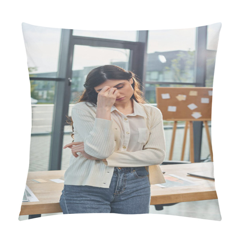 Personality  A Businesswoman Stands In Front Of A Table Holding Her Head, Contemplating Her Franchise Success In A Modern Office. Pillow Covers