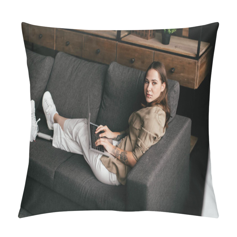 Personality  Young Woman With Prosthetic Leg Holding Laptop And Looking Away On Sofa Pillow Covers