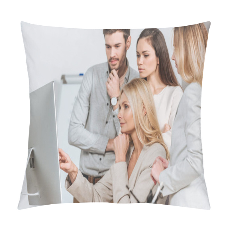 Personality  Mature Business Mentor Pointing At Desktop Computer And Working With Young Colleagues In Office Pillow Covers