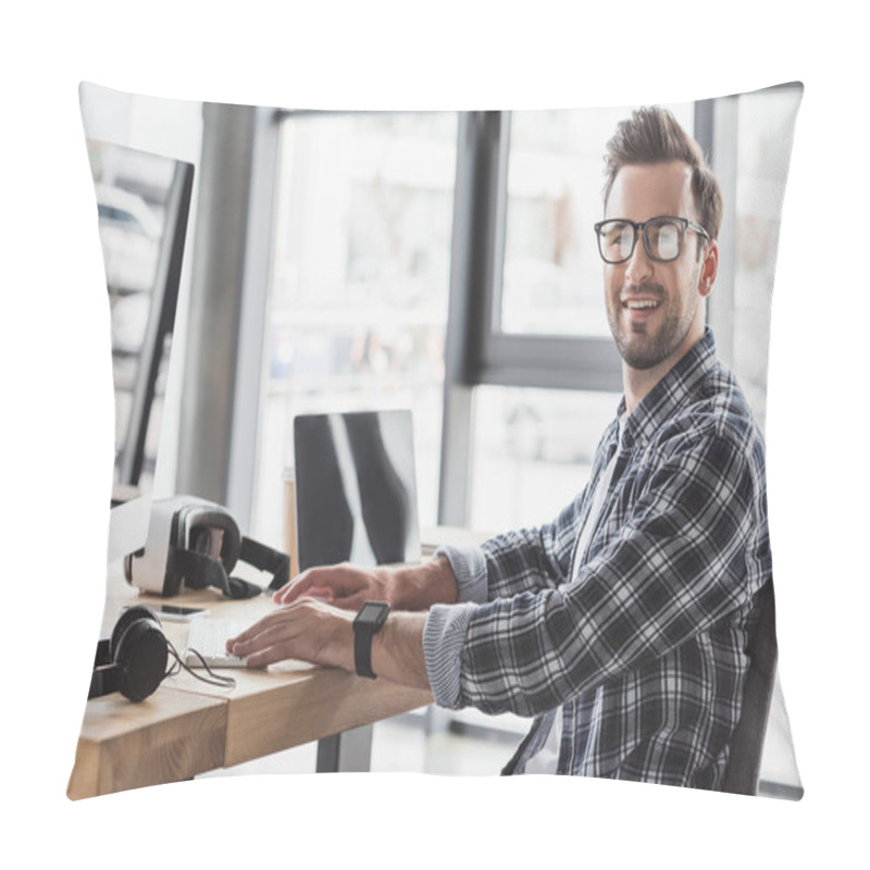 Personality  Handsome Young Man In Eyeglasses Smiling At Camera While Working With Desktop Computer And Laptop Pillow Covers