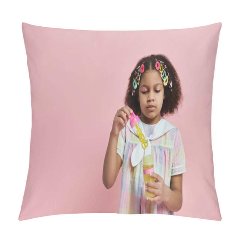 Personality  A Cute African American Girl In A Pink And White Dress And Colorful Hair Clips Holds A Bottle In Her Hand. Pillow Covers