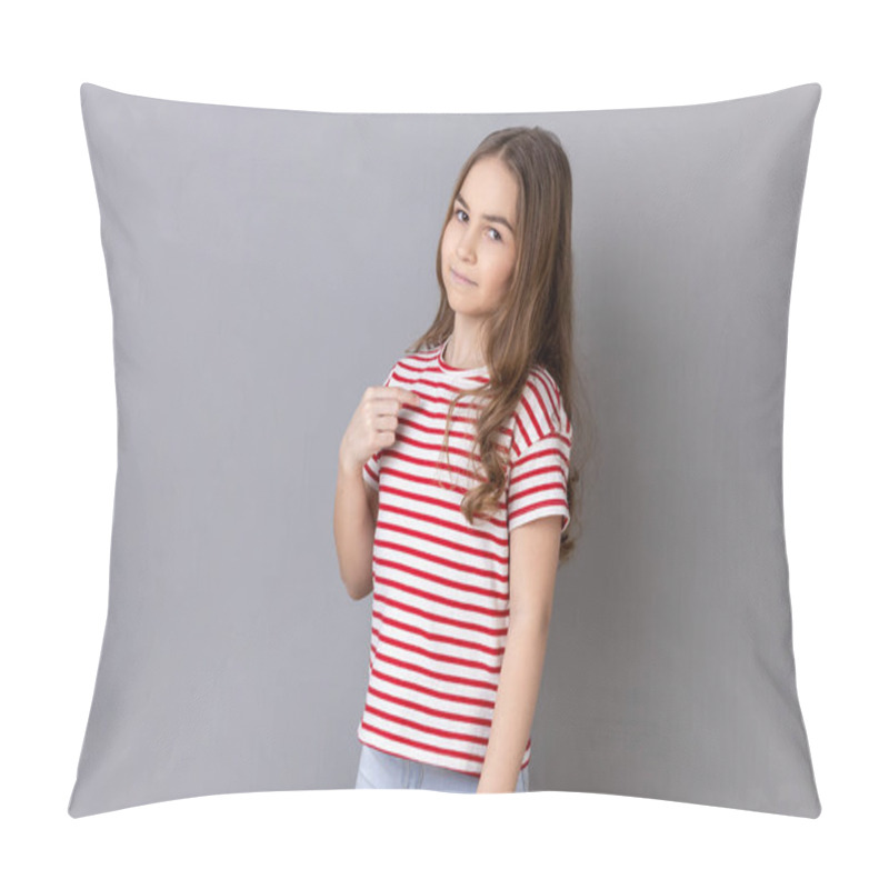 Personality  This Is Me. Portrait Of Little Girl Wearing Striped T-shirt Pointing Herself And Looking Selfish Egoistic Haughty, Feeling Proud Of Own Achievement. Indoor Studio Shot Isolated On Gray Background. Pillow Covers