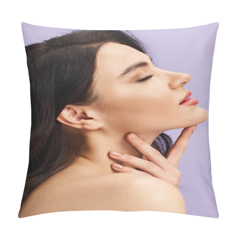 Personality  A captivating woman with her hand elegantly positioned on her neck. pillow covers